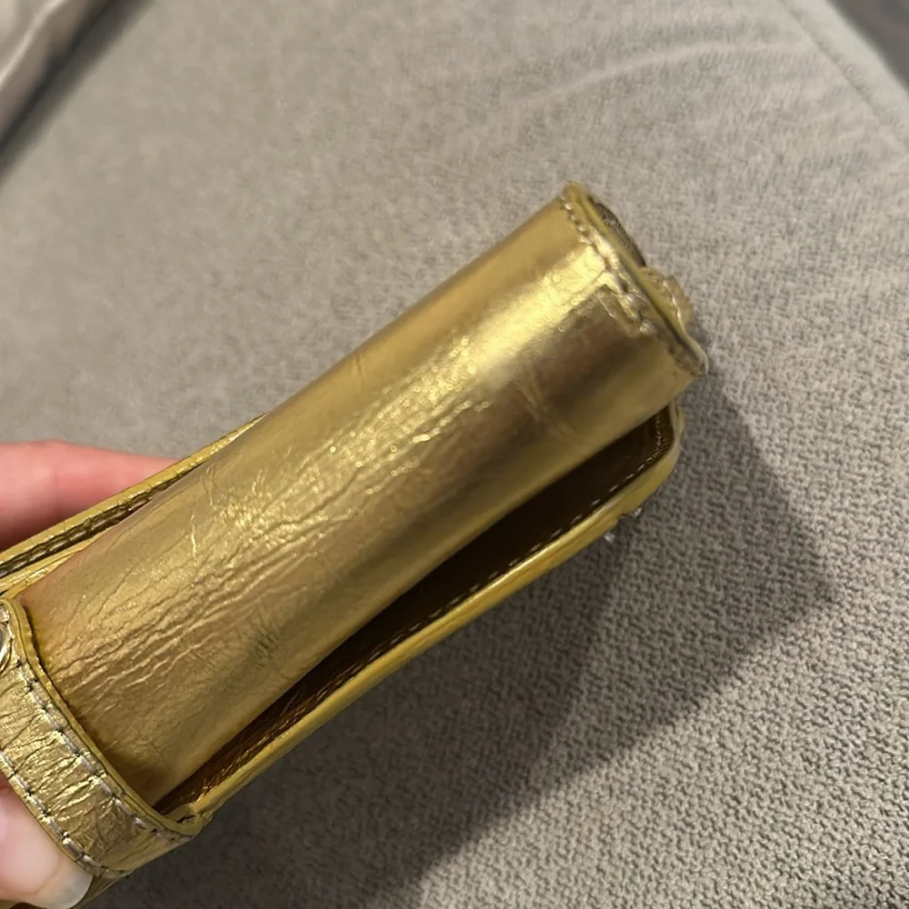 Sigerson Morrison gold wristlet/clutch
